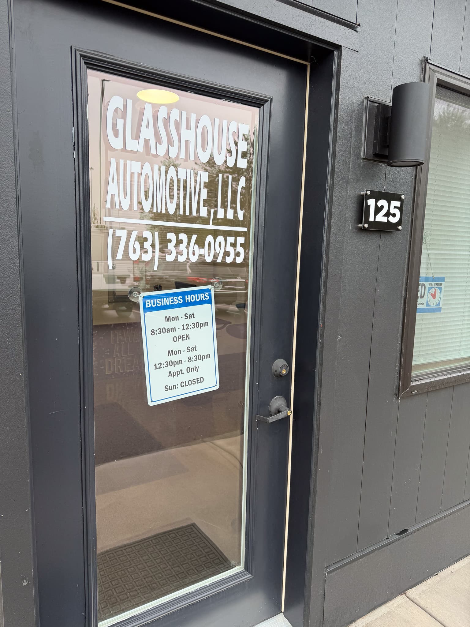 Glasshouse Automotive storefront door in Princeton, Minnesota